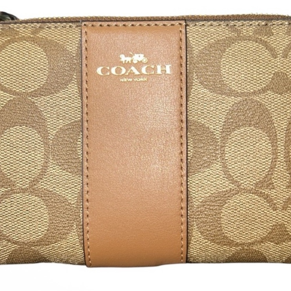 Coach Signature Brown and Tan Wallet. Very good used condition.